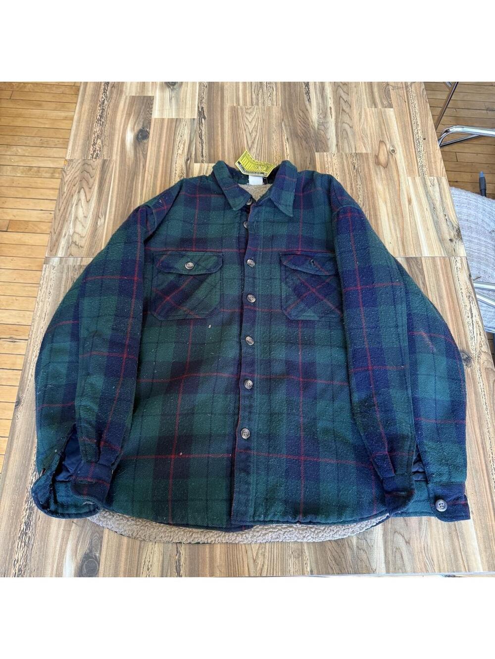 Green, red, and black plaid flannel shirt with sherpa lining